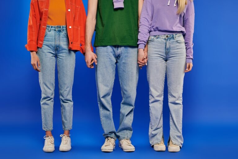 alternative family, polygamy, partial view of polyamory three people, young man and women